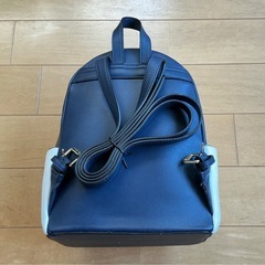& chouetteネイビーホワイト ラウンドリュックの画像
