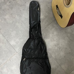 アコースティックギターと付属品　荒川区町屋駅受け渡しの画像