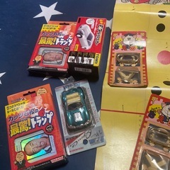 昭和玩具・ベーゴマ(ひも付・ガッツ石松トランプ2つ・恐竜の骨パズル・プルバックカーなど)の画像