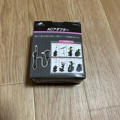 バッティング用トスマシーンとネットの画像