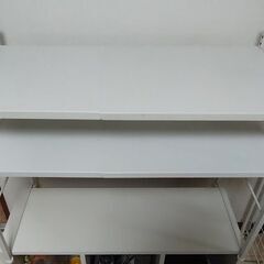 幅無段階縮小可能レンジ上ラックの画像