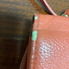 オレンジ色のハンドバッグ18-140の画像