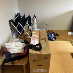 部屋の荷物を車に積むお手伝い