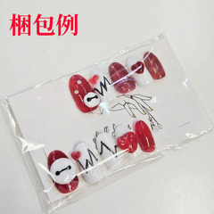 新品未使用 ハンドメイド オリジナルネイルチップ 赤×白×ハートxくまモチーフデザイン 付け爪の画像