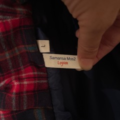 ネイビーのフード付きダッフルコートの画像