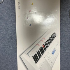 電子ピアノとスタンドの画像