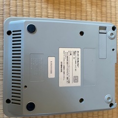 Nintendo Super Famicom 本体とコントローラーの画像