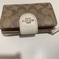 COACH 二つ折り財布 ベージュの画像