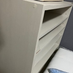 収納ボックスと扇風機の画像
