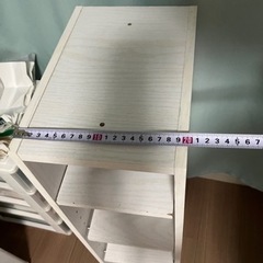 収納ボックスと扇風機の画像