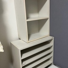 収納ボックスと扇風機の画像
