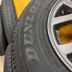 スズキ ジムニー JB64 JB74 純正 新車外し ダンロップ GRANDTREK AT20 195/80R15 ホイール付きタイヤ4本セットの画像