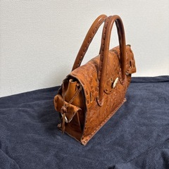 CARVING TRIBES ハンドバッグ
の画像