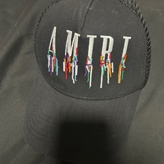 【AMIRI】ロゴメッシュ PANELLED TRUCKER CAPの画像