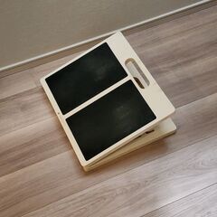 姿勢を保つための傾斜板。の画像