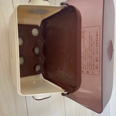Combi 哺乳瓶用消毒ケース アイボリー/ブラウンの画像