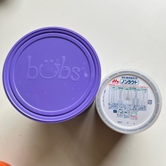 ミルクの空き缶の画像