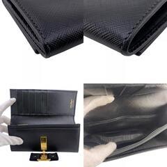 サルヴァトーレフェラガモ Salvatore Ferragamo 二つ折り財布 ヴァラリボン フラップ ブラックの画像