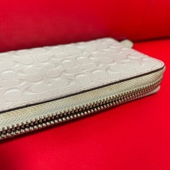 COACHコーチ　水色の長財布の画像