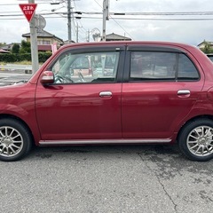 🉐車検２年付‼️ミラジーノ❣️たったの８万キロ‼️希少Ｘリミテッドレッドカラー‼️おしゃれなくせして走りは本物‼️一生付き合える１台です❣️ライト磨き済み‼️ドライブレコーダー‼️の画像