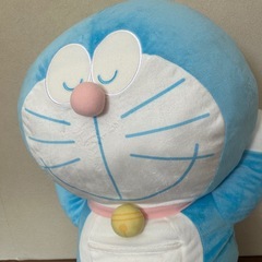 寝てるドラえもんぬいぐるみ大の画像