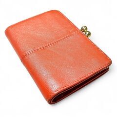 COACH がま口二つ折り財布　レザー　オレンジの画像