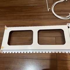 ニトリ　伸縮ざるボウルフライパンスタンドの画像