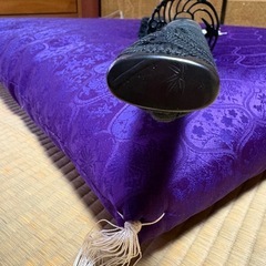 黒色の居合刀、鋼製刀身。の画像