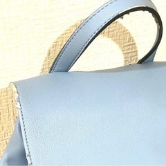 【お譲り予定者決定】GUESSリュック　ブルー　劣化のため革の剥がれありの画像