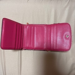 COACHの花柄財布の画像