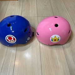 株式会社アサヒ自転車ヘルメットマリオカートヘルメット、ピノキオ、ピーチ2個セットの画像