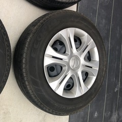 【商談中】14インチ　スチールホイール　キャップ付きe12ノート　日産　　　　185/70r14の画像