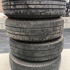 【商談中】14インチ　スチールホイール　キャップ付きe12ノート　日産　　　　185/70r14の画像