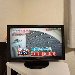 液晶テレビとテレビ台の画像