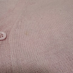 ピンクの可愛いカーディガンの画像