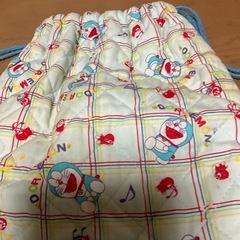 ドラえもん柄のナップサックの画像