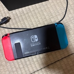 Switch 本体とドッグ、スプラ3カセット、コントローラーの画像