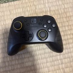 Switch 本体とドッグ、スプラ3カセット、コントローラーの画像