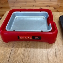 電気たこ焼器とケトルの画像