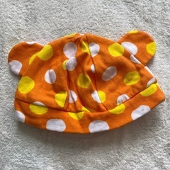 クマ耳帽子、おにぎり靴下の画像