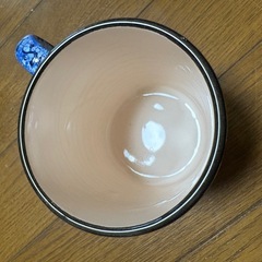 派手なお花のマグカップの画像