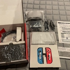 Nintendo Switch 本体 + マリオカート8 + ドラえもんケースの画像