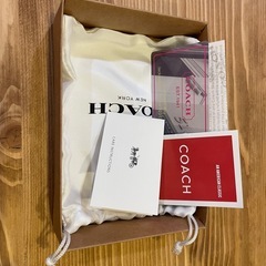 coach いちご柄　折りたたみ財布の画像