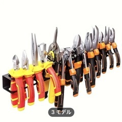 ドライバー、ペンチ類を整理する金具
の画像