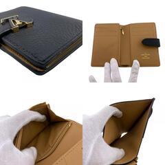 ルイヴィトン LOUIS VUITTON 二つ折り財布 ノワール LVヴェルティカルウォレットコンパクト トリヨン ブラックの画像