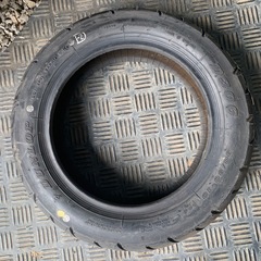 ダンロップ90/90-10 新古タイヤの画像