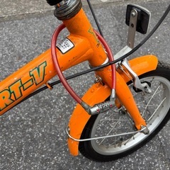 オレンジカラー　自転車　折りたたみ自転車の画像