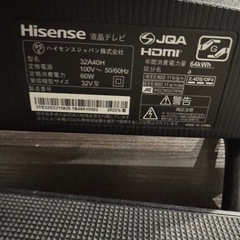 テレビとサウンドスピーカーセットの画像