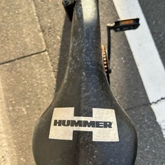 折りたたみ可能なHUMMERのブラック自転。の画像