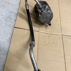 MH23S エアコンコンプレッサーの画像
